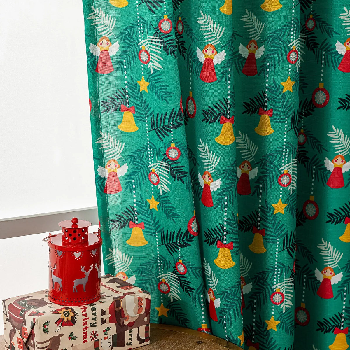 Green Christmas curtain with printed snowman and angel cartoon pattern