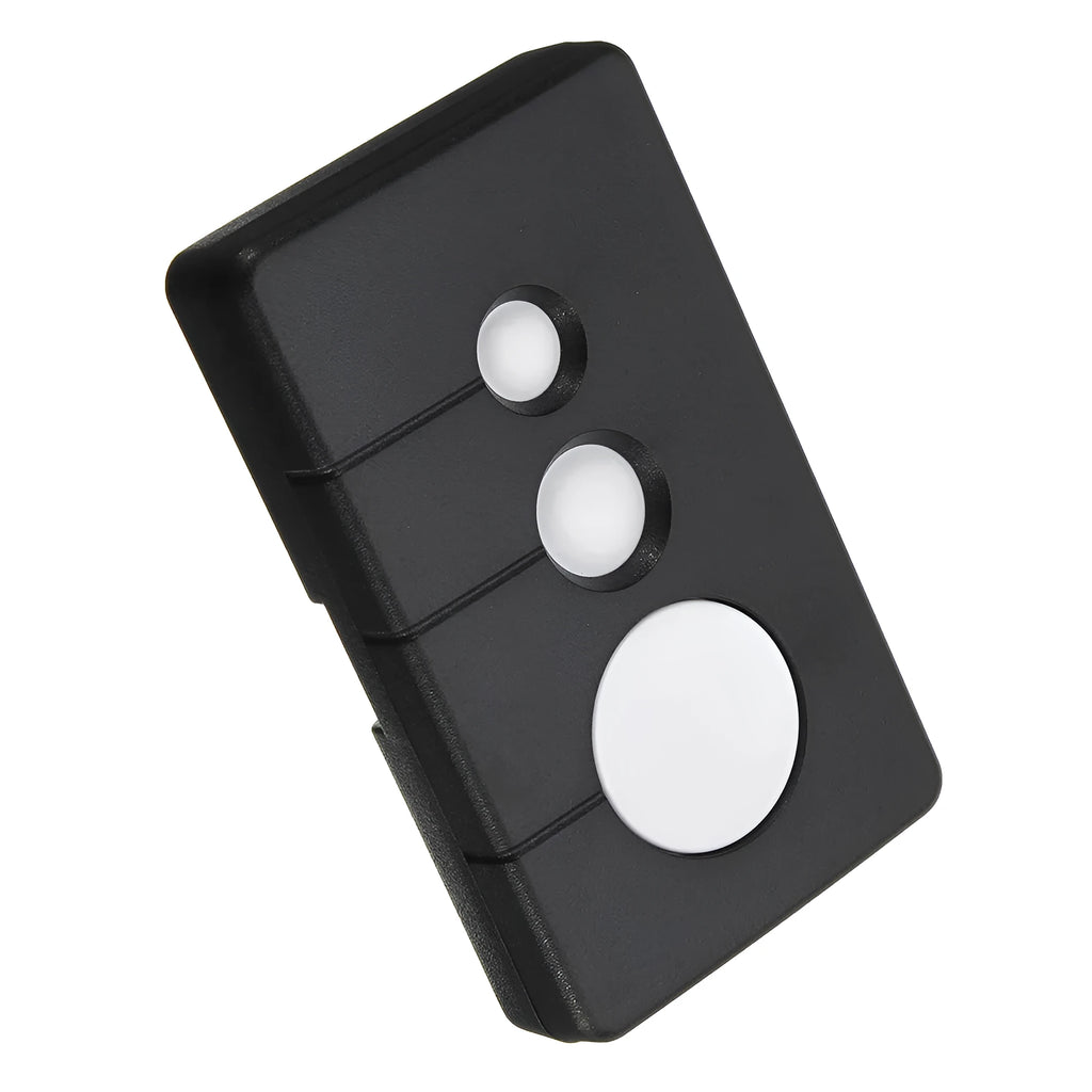 Black plastic three-button garage door remote control next to a CR2032 battery.