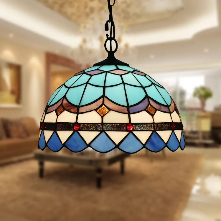 European retro Baroque chandelier with coloured glaze finish and abstract modelling.