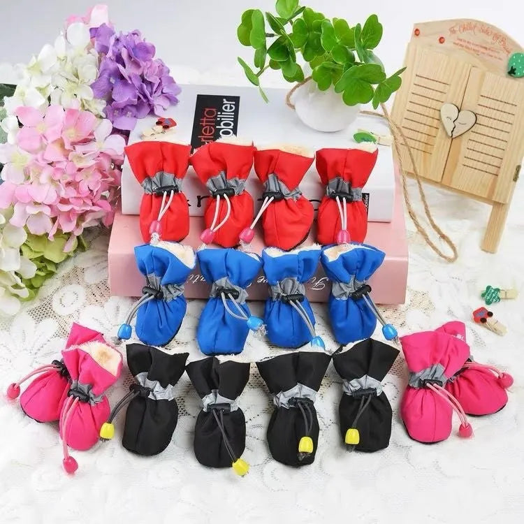 Pet dog shoes in multiple colours including rose red, black, blue monkey print, and fleece-lined options