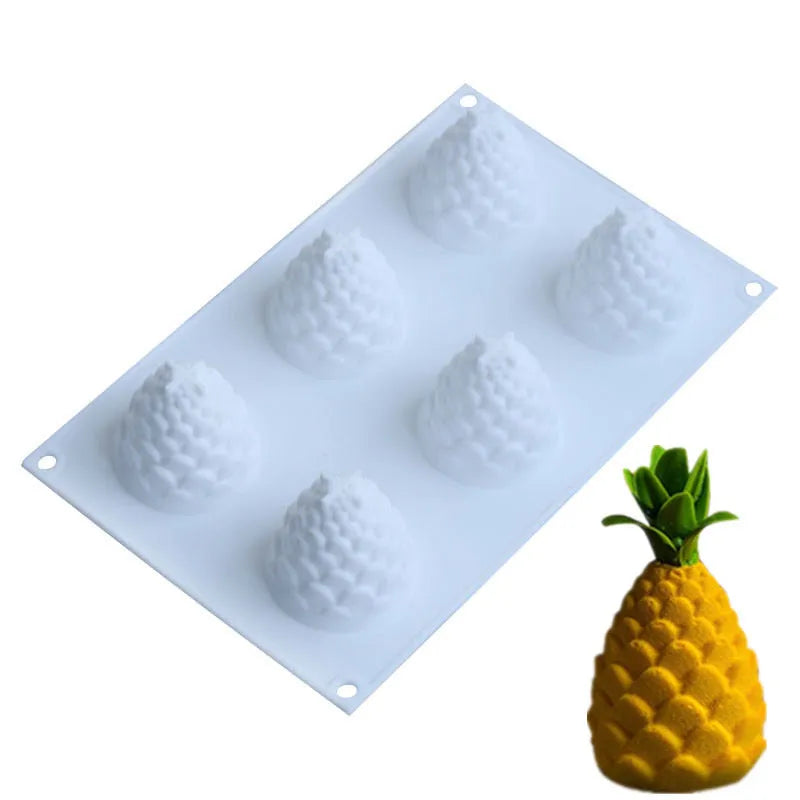Silicone fruit baking mold showing pineapple and pine cone cavities for making mousse desserts