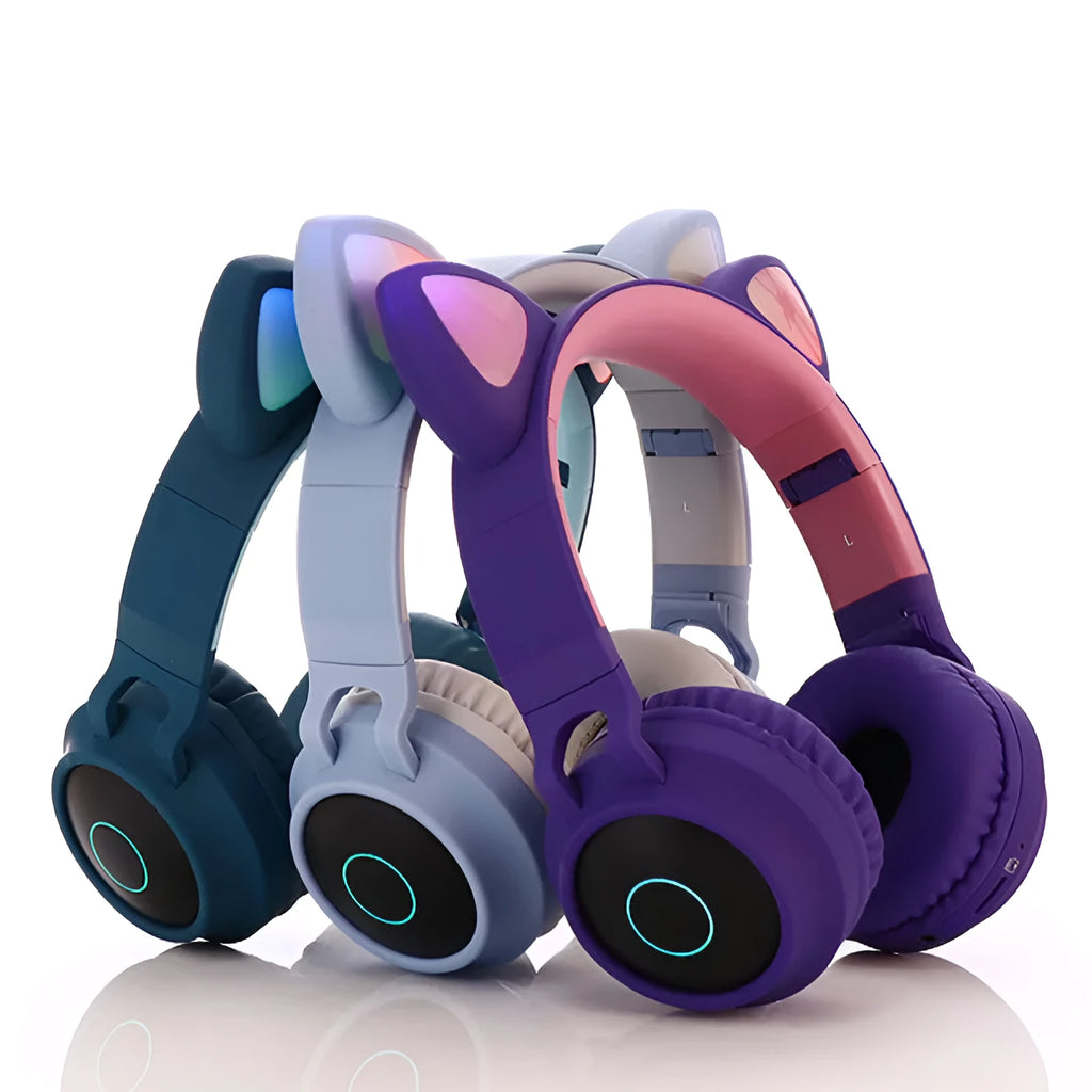 Cute Bluetooth 5.0 wireless headset in pink, foldable design with padded ear cups and 3.5mm audio port