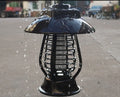 Black solar-powered insecticidal lamp with solar panel and LED lights for outdoor mosquito control