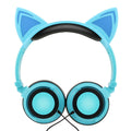 Colourful cat ear headphones with illuminated LED lights on the ears and cushions.