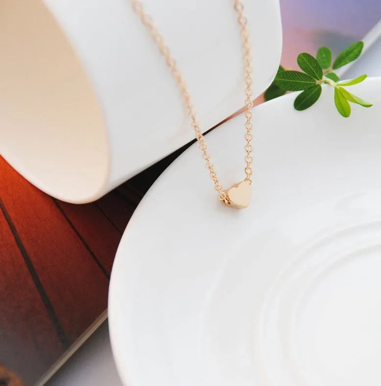 Heart & Soul choker necklace with gold plated heart-shaped alloy pendant on simple chain