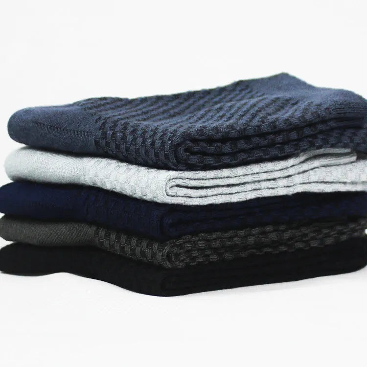 Men's bamboo fibre socks in a small square pattern, shown in neutral colours including grey and navy.