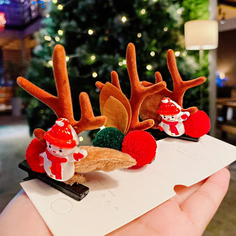 Set of plastic resin Christmas hair clips for kids with antler and snowman designs