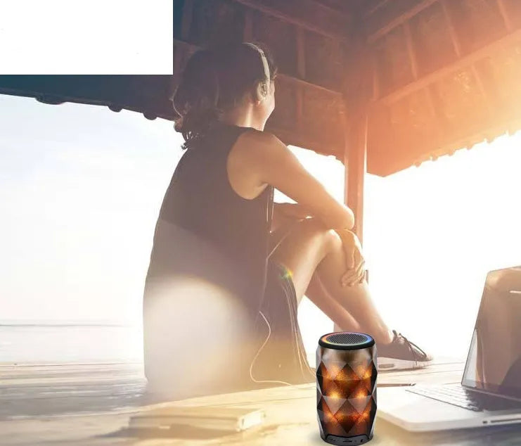 Black crystal diamond-cut Coke can shaped Bluetooth speaker and lantern with colourful LED lights.