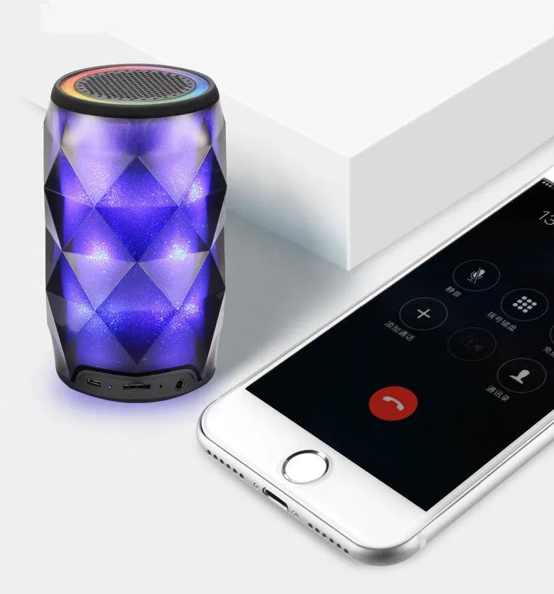 Black crystal diamond-cut Coke can shaped Bluetooth speaker and lantern with colourful LED lights.