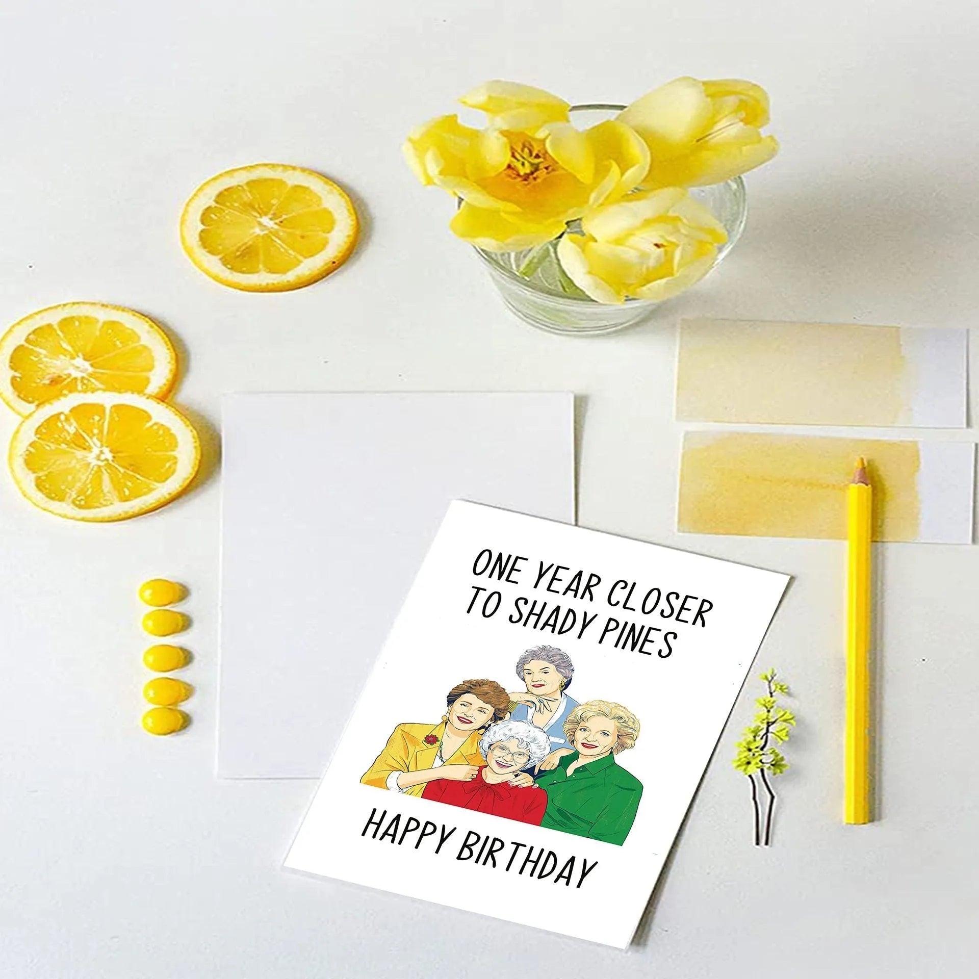 Simple modern birthday greeting card with matching coloured envelope.