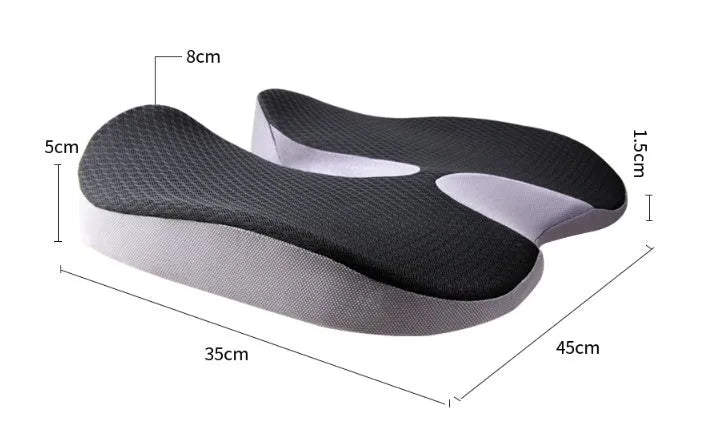 Curved bevel memory foam seat cushion for tailbone support in beige colour on a car seat.