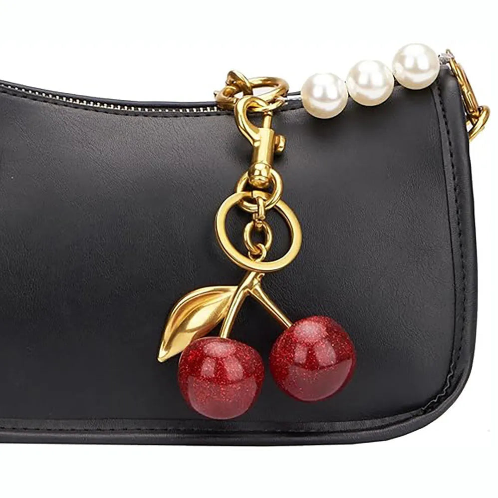 Red zinc alloy keychain with three-dimensional cherry pendant design for car keys and handbags