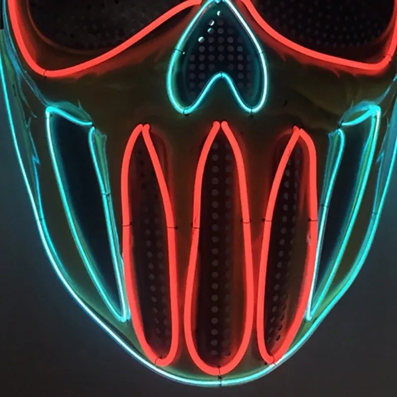 Plastic Halloween mask in ice blue and red for fancy dress and trick or treat