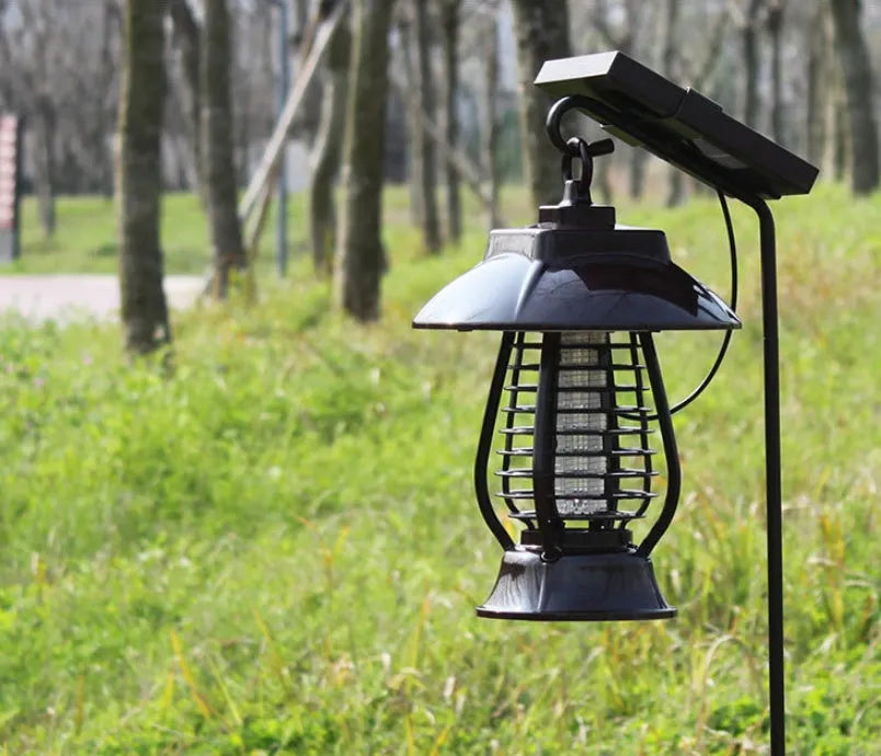 Black solar-powered insecticidal lamp with solar panel and LED lights for outdoor mosquito control