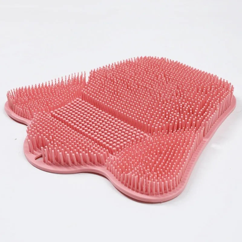 Blue silicone bath massage cushion mat with textured surface for handheld scrubbing.