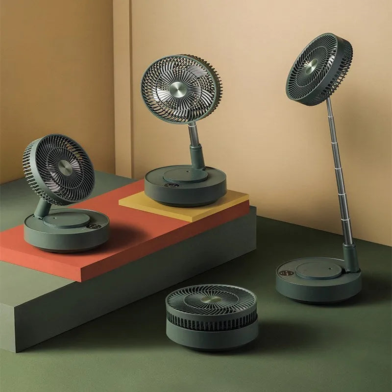 Green telescopic floor-standing electric fan with remote control in extended position