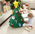 Felt Christmas tree three-dimensional craft set 50x60cm with felt ball ornaments on a white background