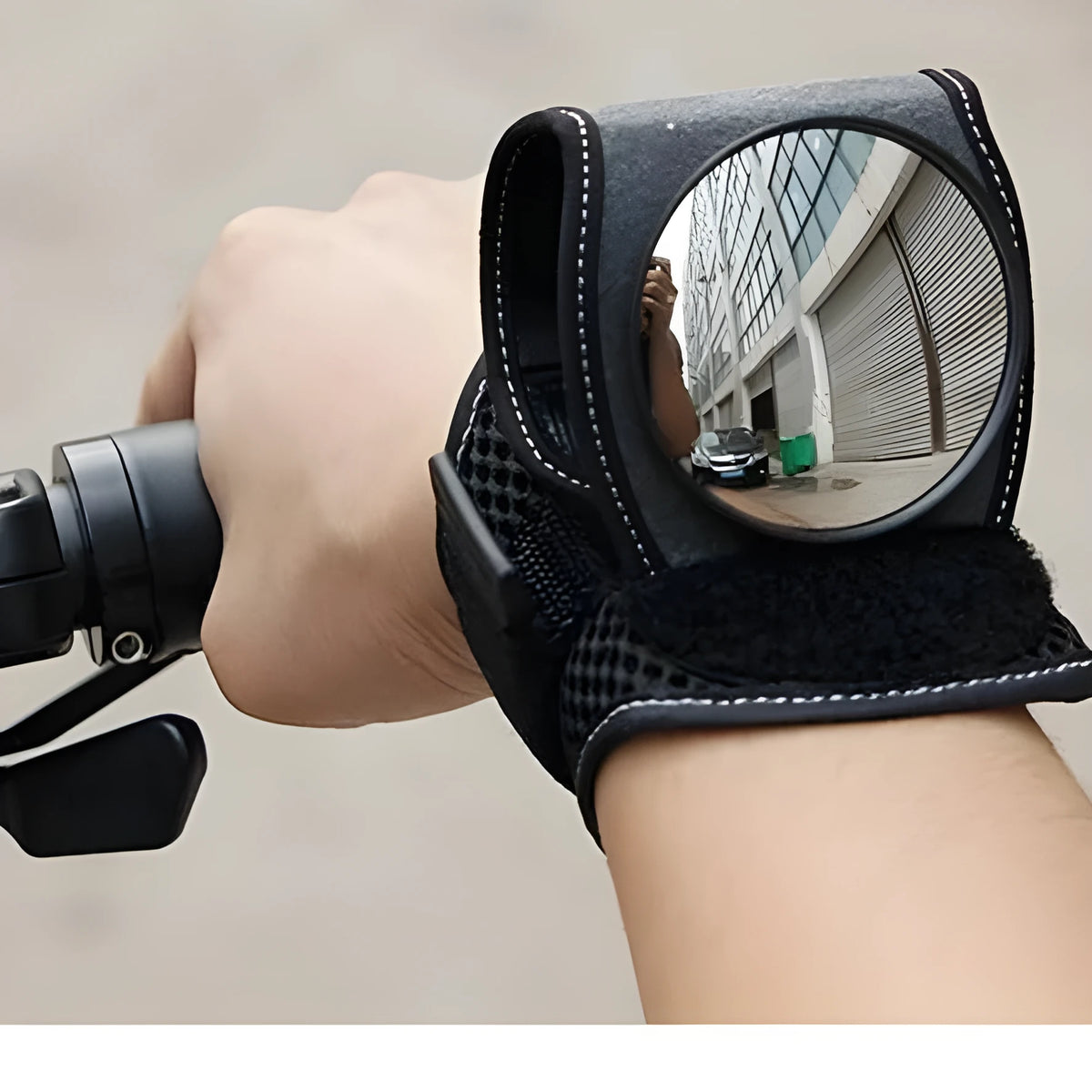 Bicycle wrist safety mirror with adjustable strap, breathing mesh band, and approx 5cm mirror diameter