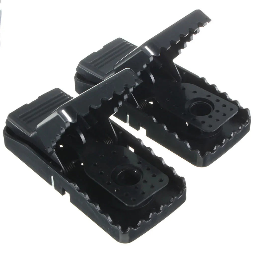 Pack of six black plastic mousetraps showing snapping mechanism and measurements