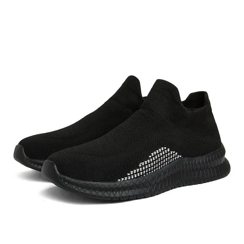 Popcorn Flyknit low-top fabric sneaker in solid colour on a white background.