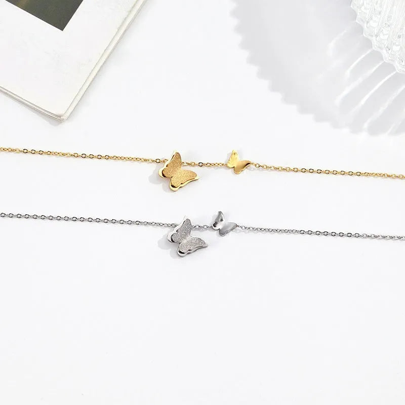Gold butterfly anklet with stainless steel single chain, about 21cm plus 5cm extension