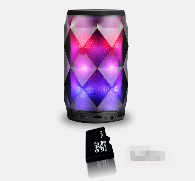 Black crystal diamond-cut Coke can shaped Bluetooth speaker and lantern with colourful LED lights.