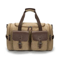 Medium canvas travel bag with zip opening, double straps, soft handle, and backpack shoulder pad in black, blue, grey, or khaki