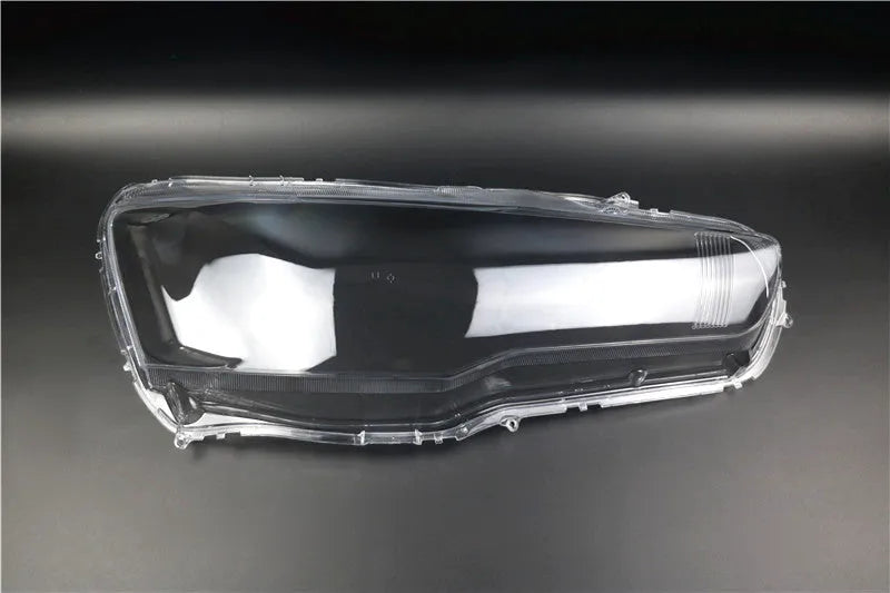 Transparent plastic headlight housing cover showing 50x30x20mm dimensions