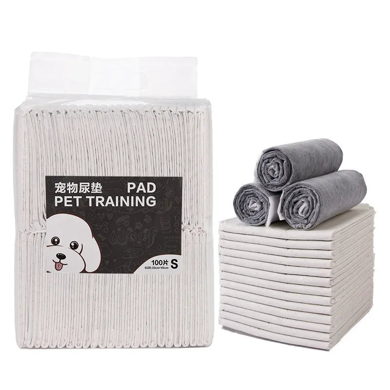 Pet urinal pads with bamboo charcoal in S M L XL sizes on white background