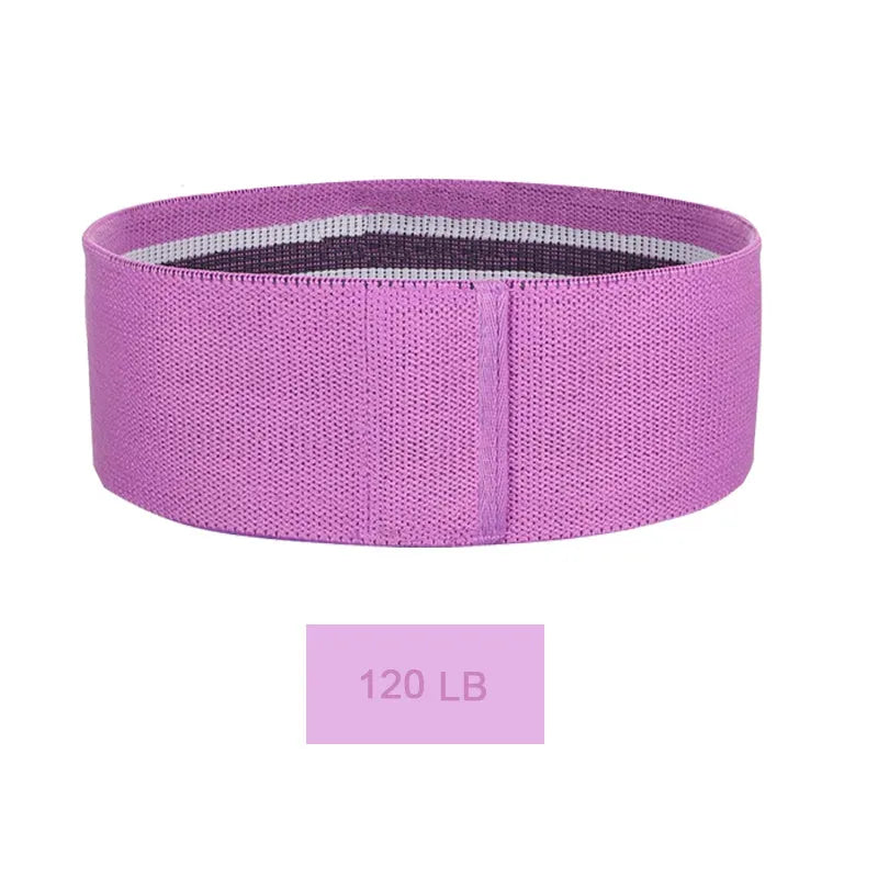 Squat resistance band hip ring in green, pink, or purple, made from latex silk and polyester webbing