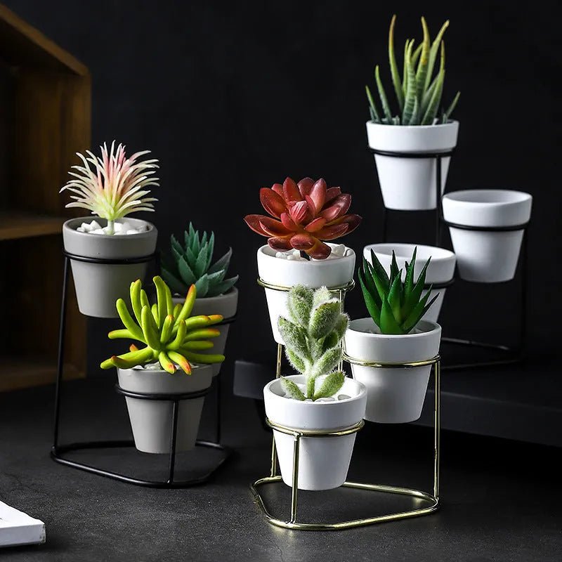 Grey pottery flower pot set with electroplated finish, shown in black grey, black white, gold grey, and gold white colour options