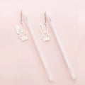 Plastic gel pen with decorative paper crane pendant and 0.38mm fine tip, shown at 17cm length.