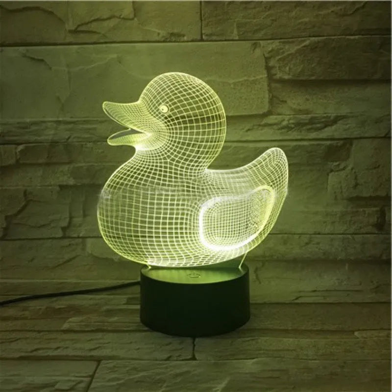 Little Yellow Duck 3D LED night light showing acrylic duck shape on ABS base, with remote control.