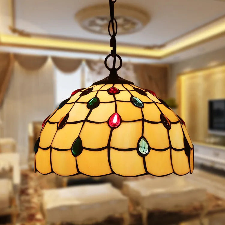 European retro Baroque chandelier with coloured glaze finish and abstract modelling.