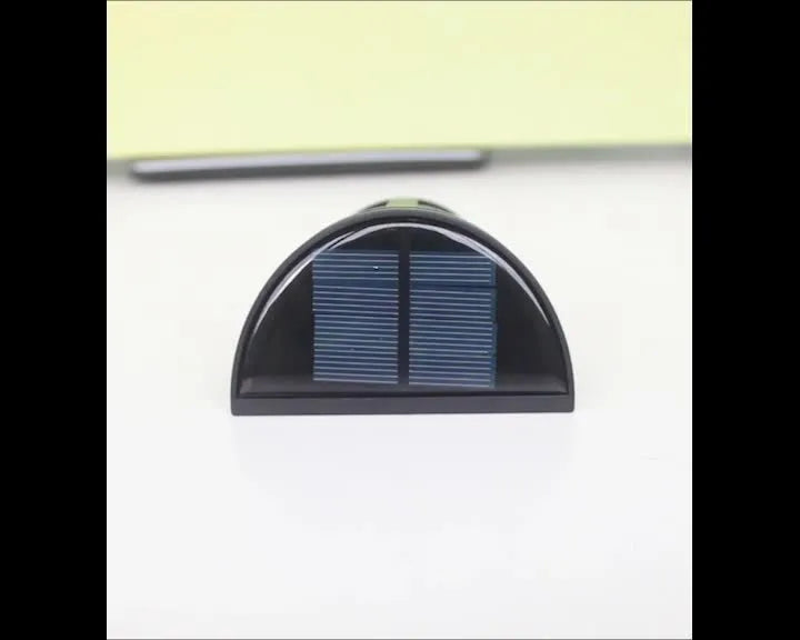 Solar-powered outdoor wall lamp with six LEDs and IP65 waterproof rating for garden and courtyard lighting