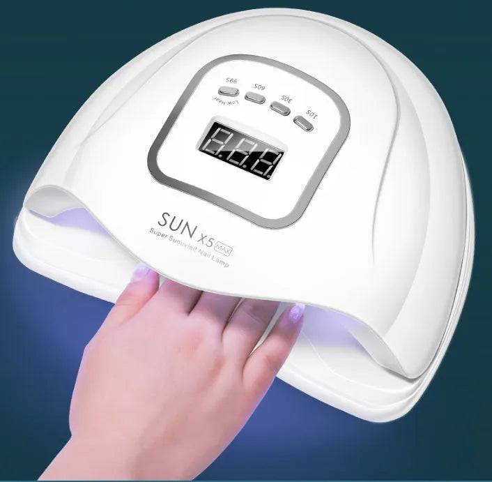 White nail polish drying lamp with dual UV LED light sources and multiple timer buttons