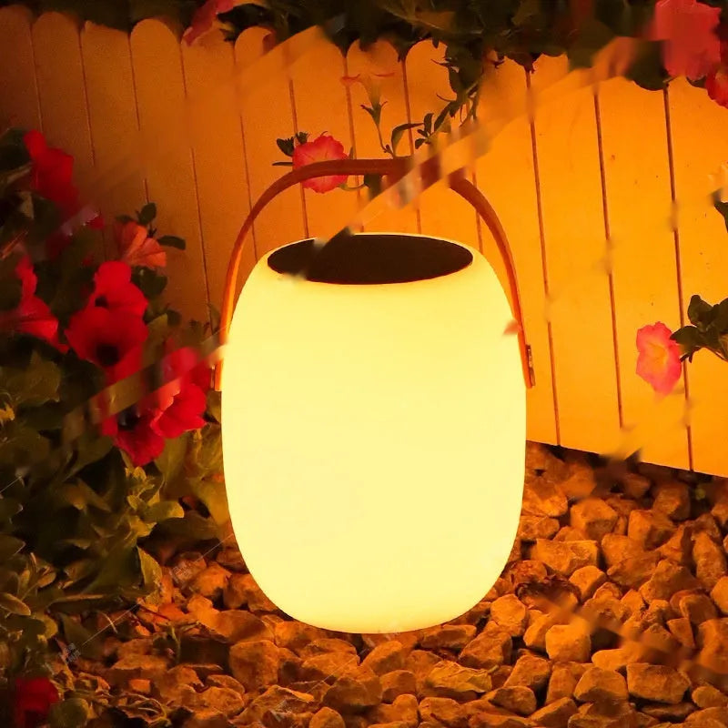 White plastic solar garden ambience light with IP65 rating, USB charging, shown in 18x27cm and 21x31cm sizes