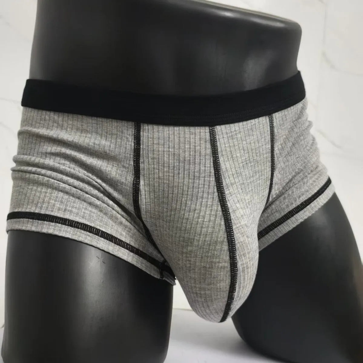 Men's solid colour breathable boxer shorts on a size chart showing weight ranges for L, XL, 2XL, and 3XL.