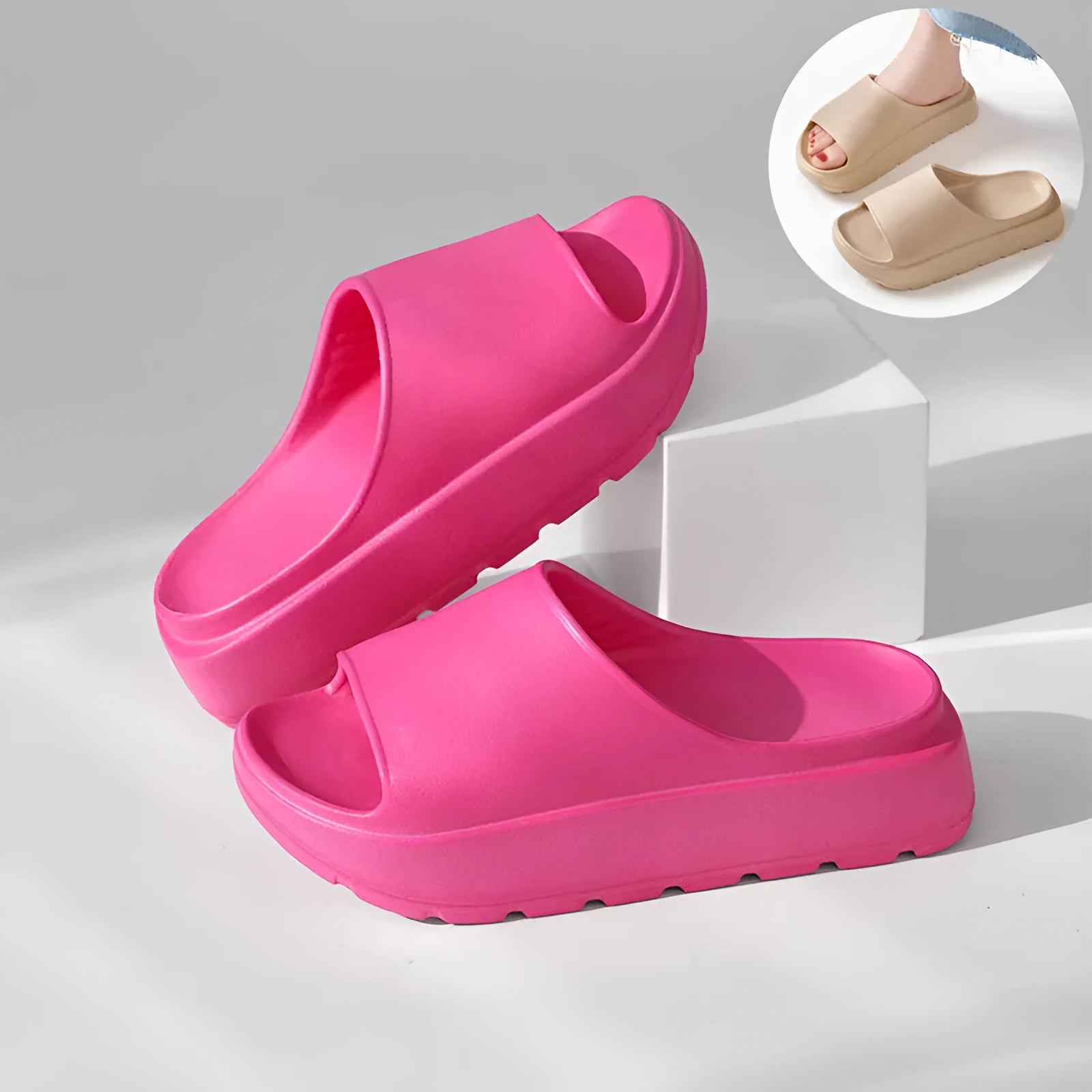 Women's beige EVA fish mouth slippers with a thick 5.5cm sole on a tiled floor.