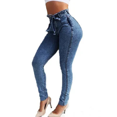 Men's dark blue fringed jeans with distressed frayed hemline detailing