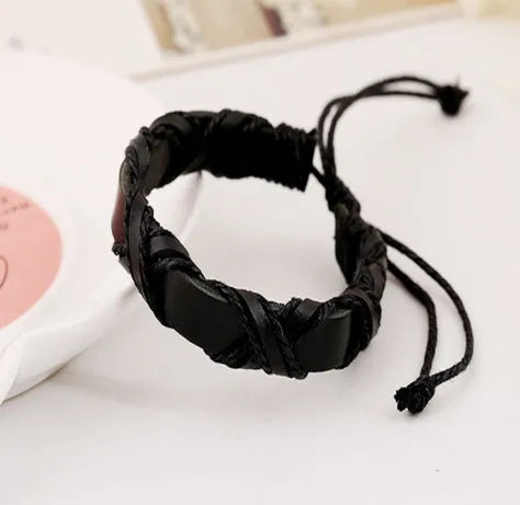 Asgard crafted leather Nordic arm bracelet in brown cowhide with black hemp rope adjustable fit