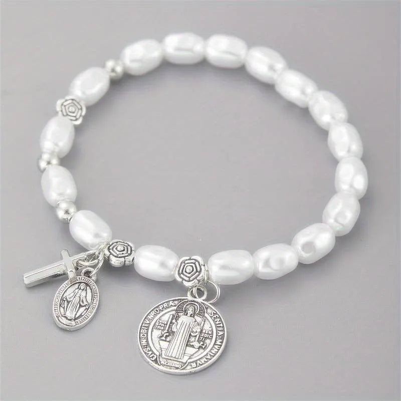 Silver beaded flower bracelet on display with metal links