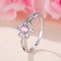 Women's electroplated copper ring with floral hollowed design in platinum pink diamond colour