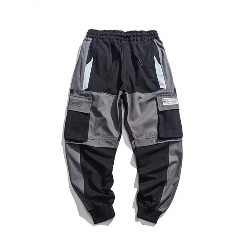 Men's loose fit hip hop beam pants in khaki cotton-rich fabric, mid waist, tether closure, small feet hem, available in black and white.