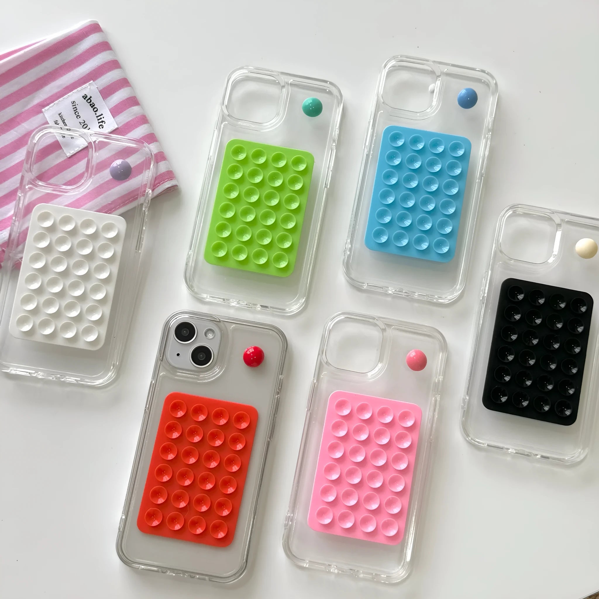 Silicone phone case with suction cup for iPhone 15 Pro Max in black showing back and edge coverage