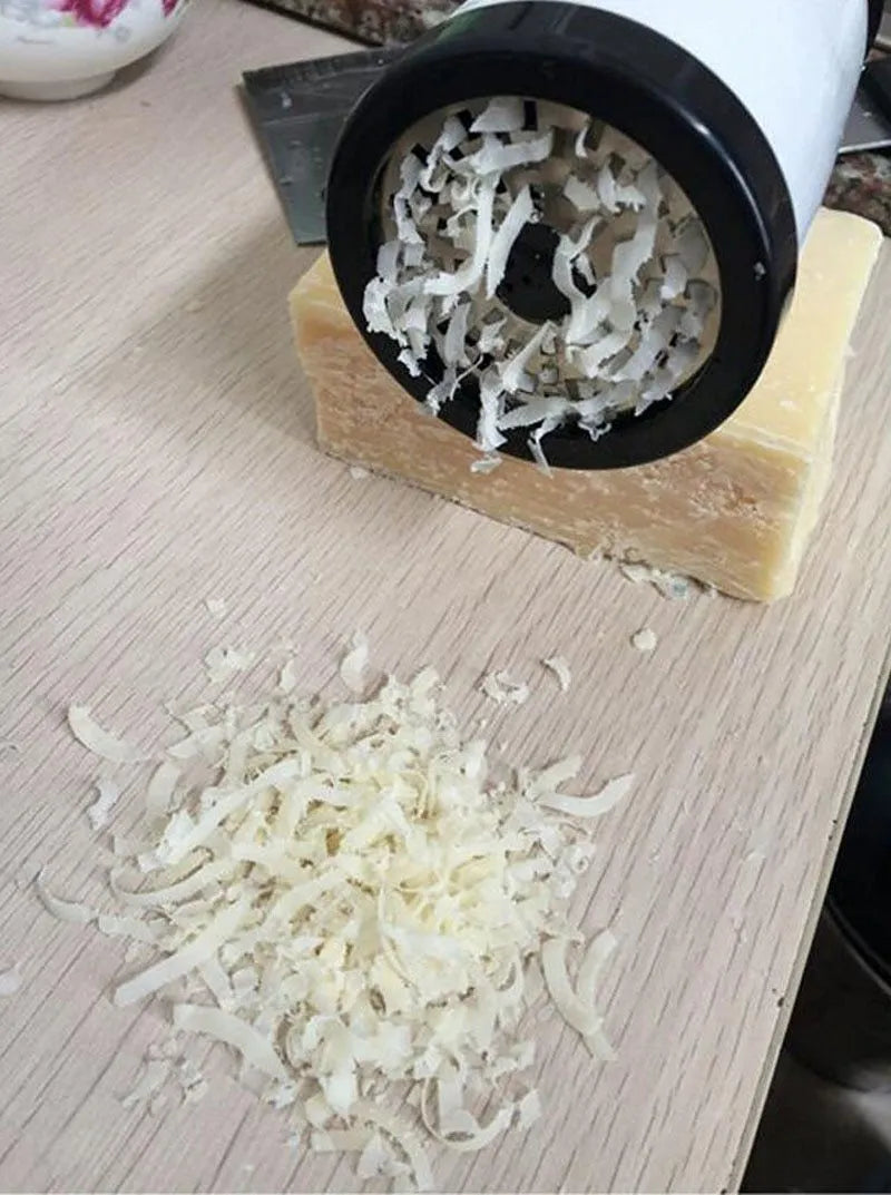 Stainless steel rotary cheese grater 17cm tall with black and white finish, hand crank and two blades