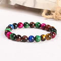 Colourful tiger-eye stone beaded bracelet with round beads on a cord, showing size options.