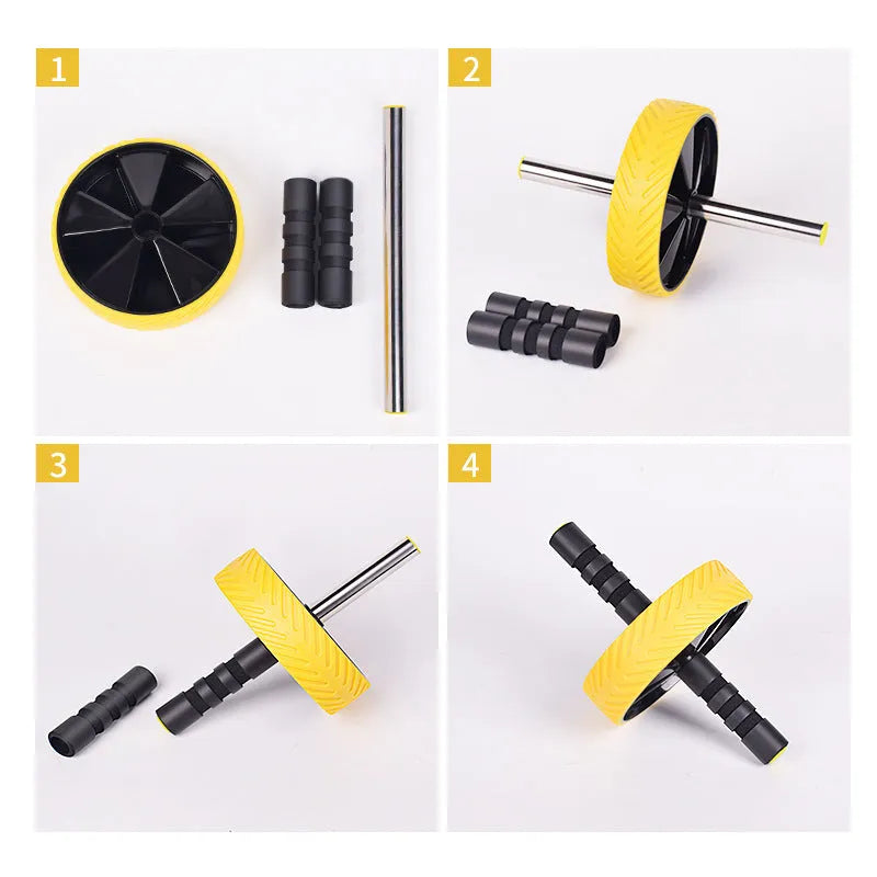 Exercise belly roller with black NBR wheel on a grey steel pipe frame on a carpet