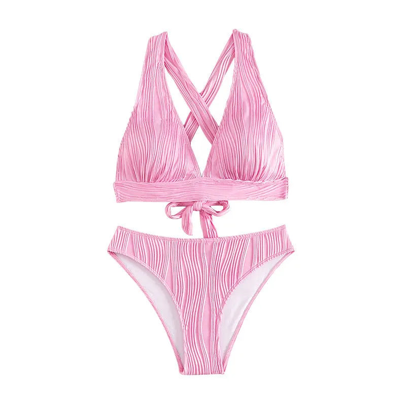 Women's pink and black halter strap bikini set with sleeveless top and shorts on a mannequin.