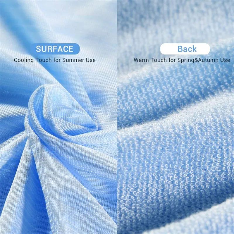 Blue cooling blanket with Japanese Q-Max fibres on a bed.